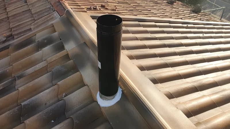 instalacion chimenea en panel teja