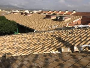 Vista de tejado rehabilitado con panel teja Ironlux